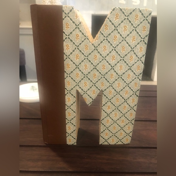 Anthropologie: Hand cut letters from Reader’s Digest books. Spells out “HOME.” - Picture 10 of 15